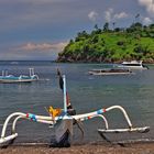 Outriggerboat on the lava beach