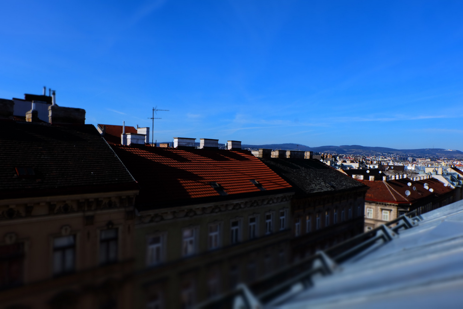 Over the rooftops and houses ...