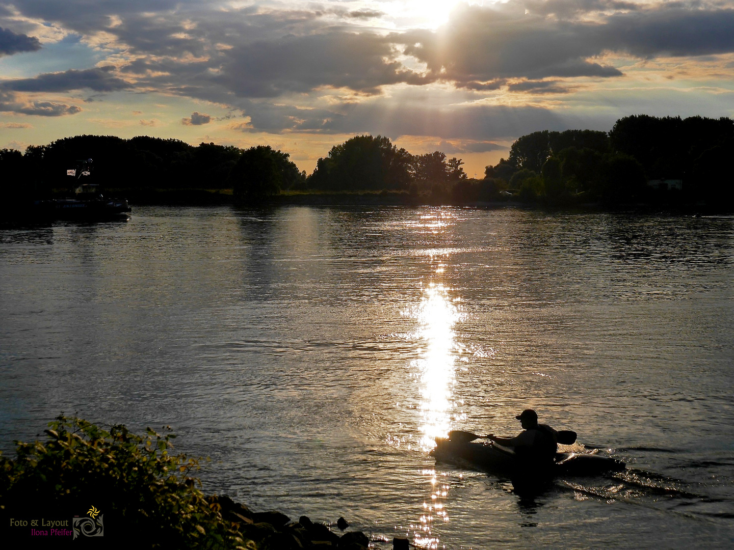 Padler im Sonnenuntergang