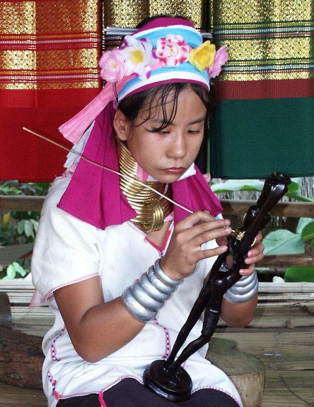 Paduang Girl preparing her merchandise