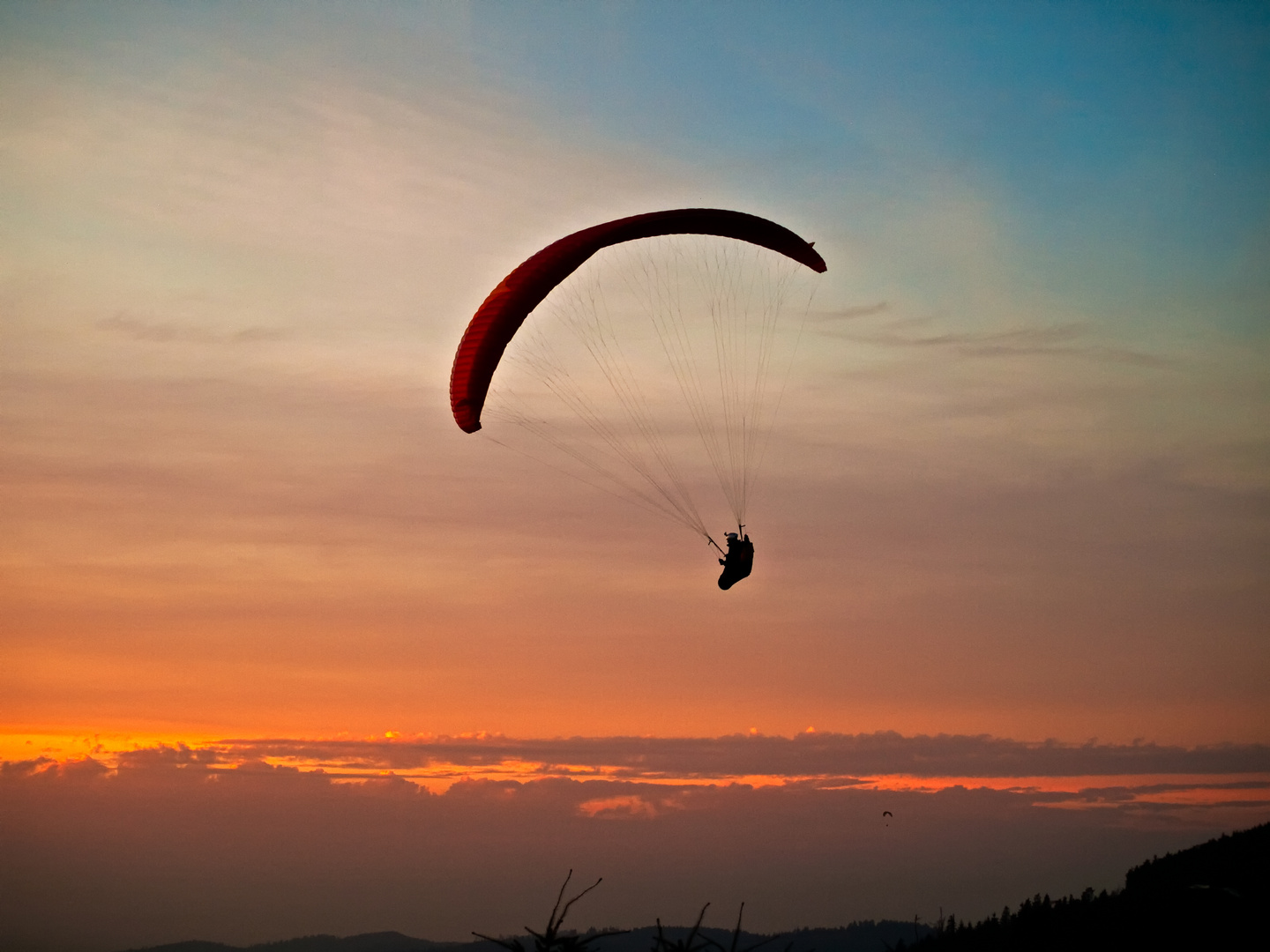 paraglide sunset