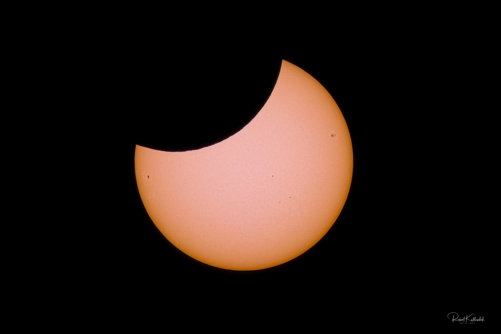 partielle Sonnenfinsternis und Sonnenflecken 