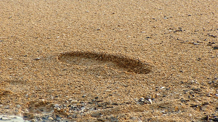 pas sur le sable