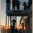 passengers watching the sunset from the DFDS ferry