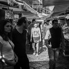 Passers-by at the popular market