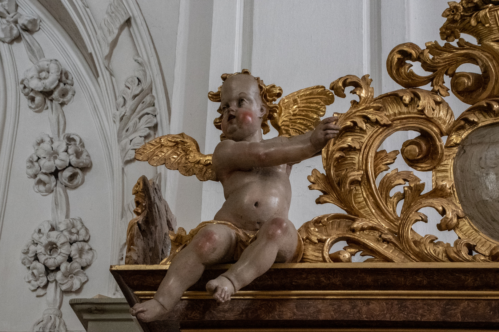 Pausbackener Putto