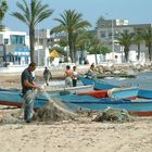 Pêcheur à ses filets