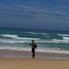 pêcheur sur la plage