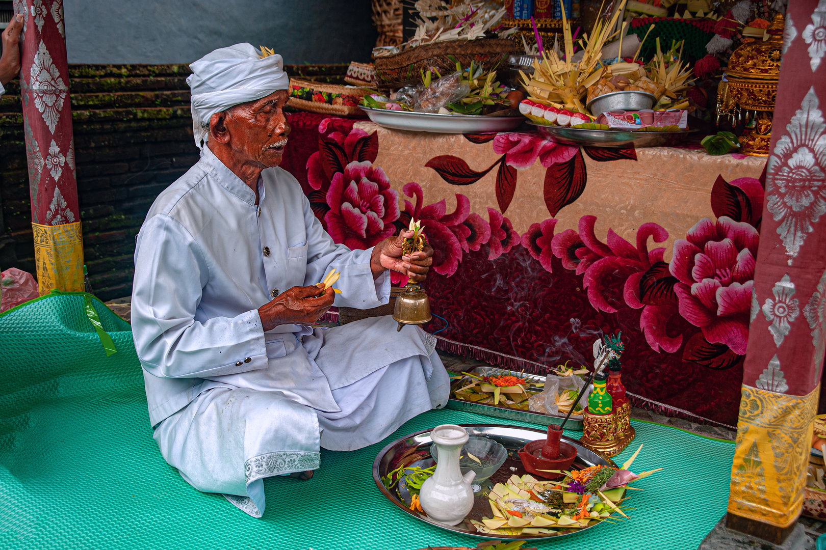 Pemangku priest blessing the ceremony