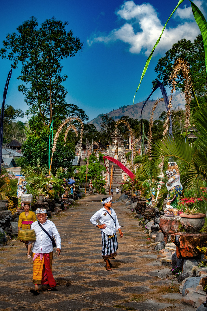 Pemangku priest leaaving the holy center