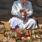 Pemangku priest takes holy rituals for the Gods