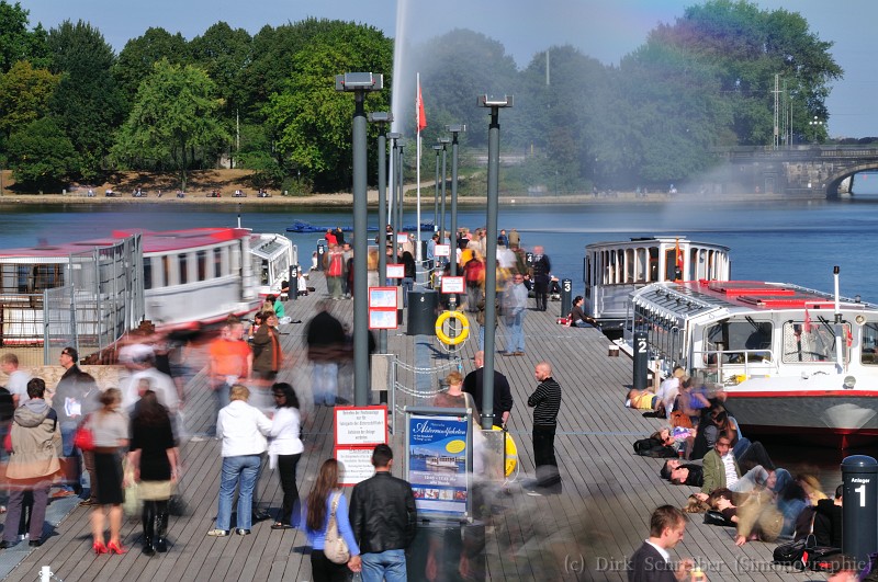 People at landing stage for Alsterboot trips in Hamburg, Germany