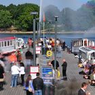 People at landing stage for Alsterboot trips in Hamburg, Germany