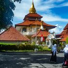 People in front of Vihara Buddha Guna Pagoda