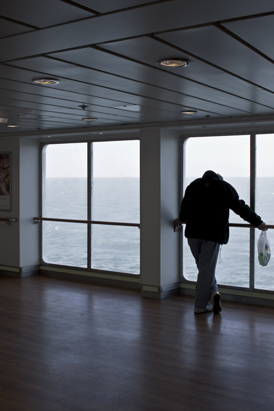 PEOPLE ON A FERRY 23