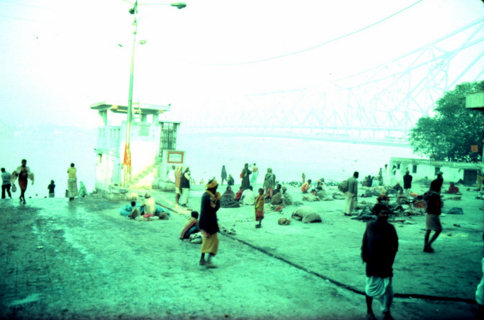 People scattered alongside Ganga