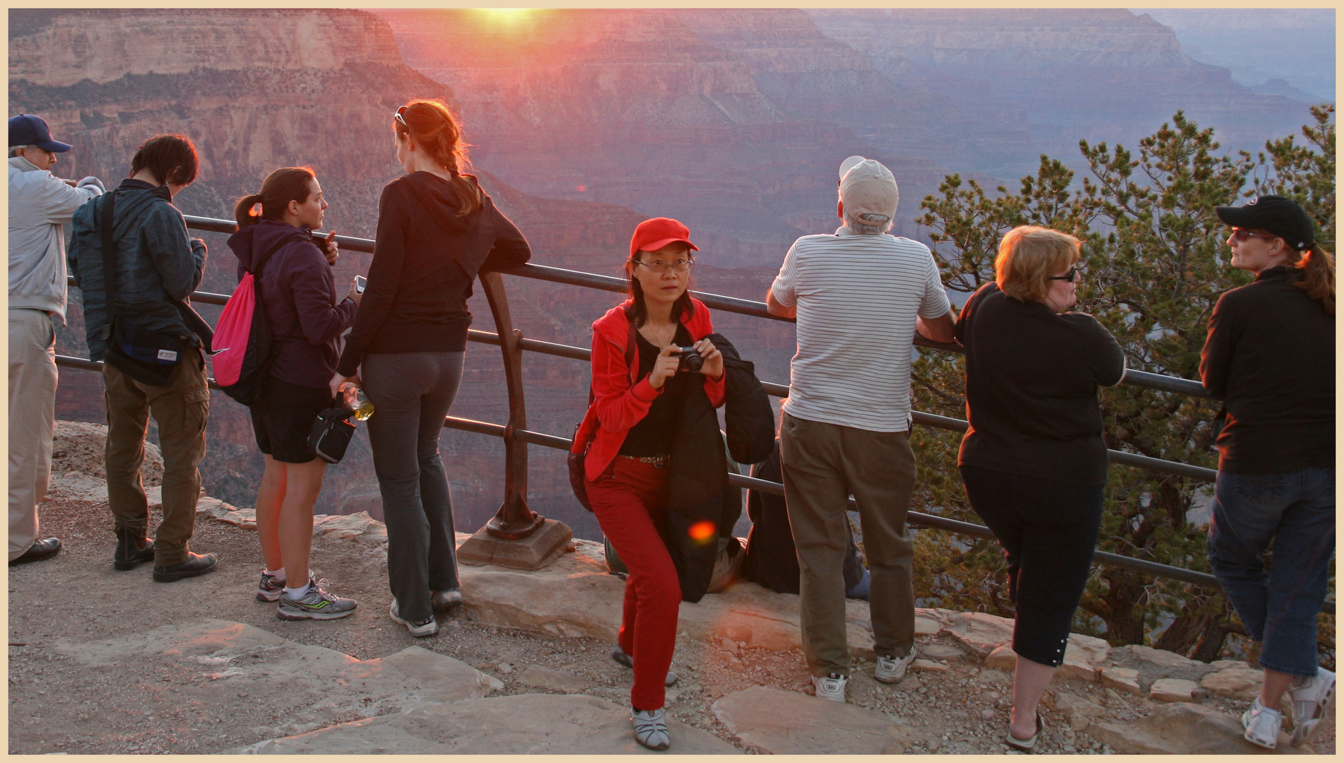 people watching sunset at hopi point 