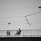 people_on_bridge_graz