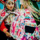 Peru | Women wearing a traditional costume during carnival festivities