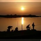 Pesca al tramonto sulla foce del Coghinas