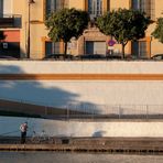 pescando al amanecer en Triana