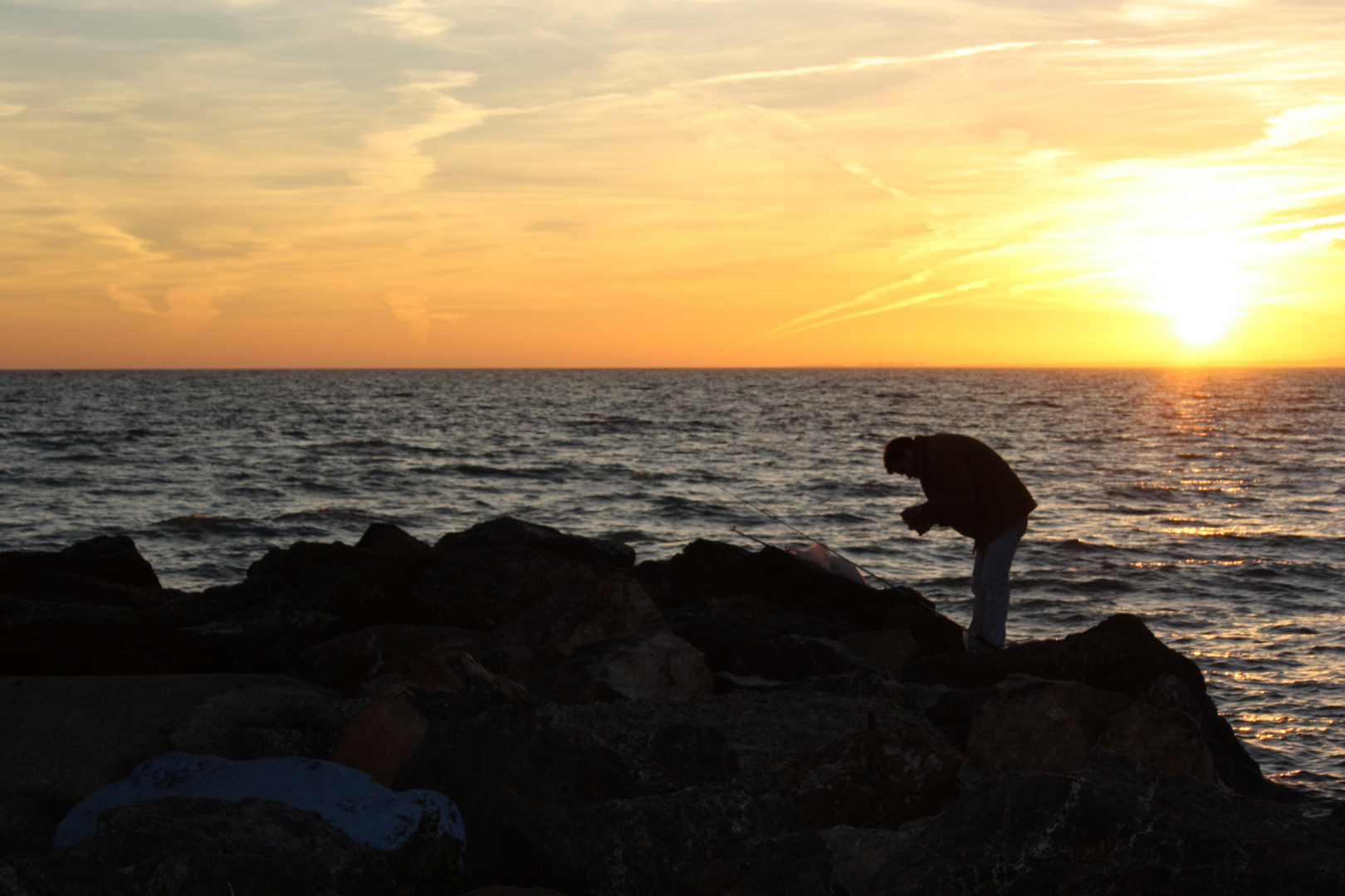 Pescatore nel tramonto
