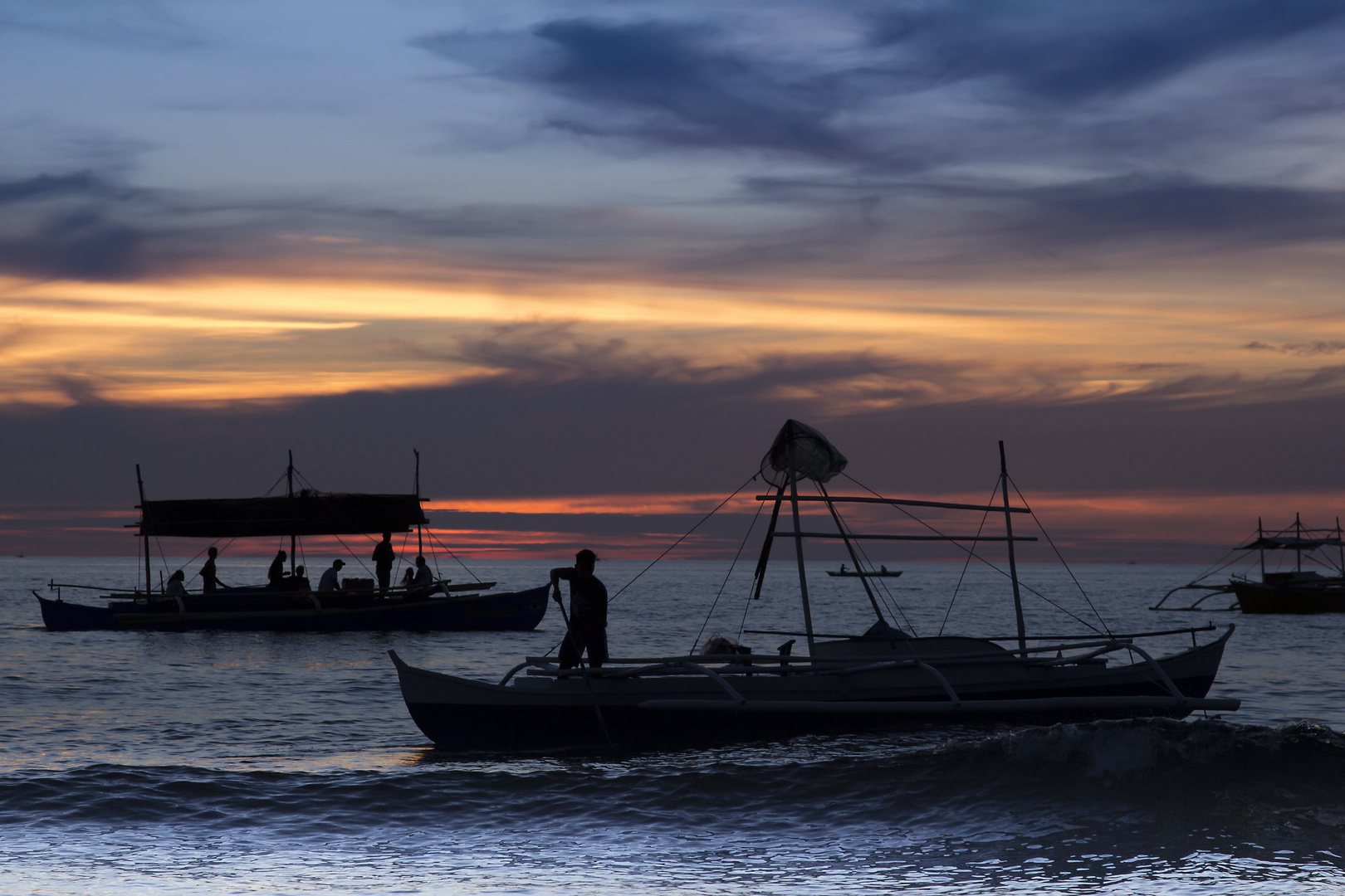 Pescatori in controluce