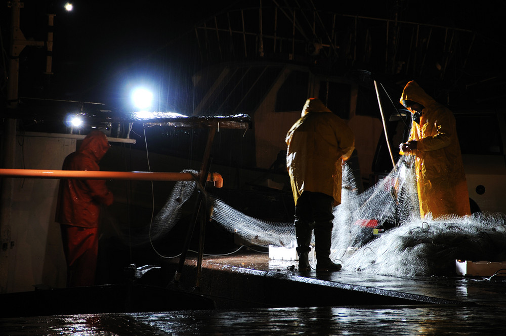 Pescatori sotto la pioggia