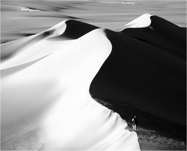 Photographe à la chasse des dunes érotiques