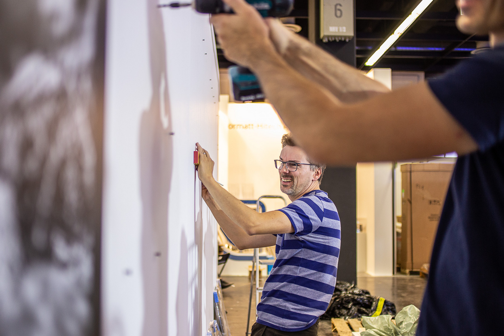 photokina 2018 - Aufbau der fotocommunity Ausstellung in Halle 2.2