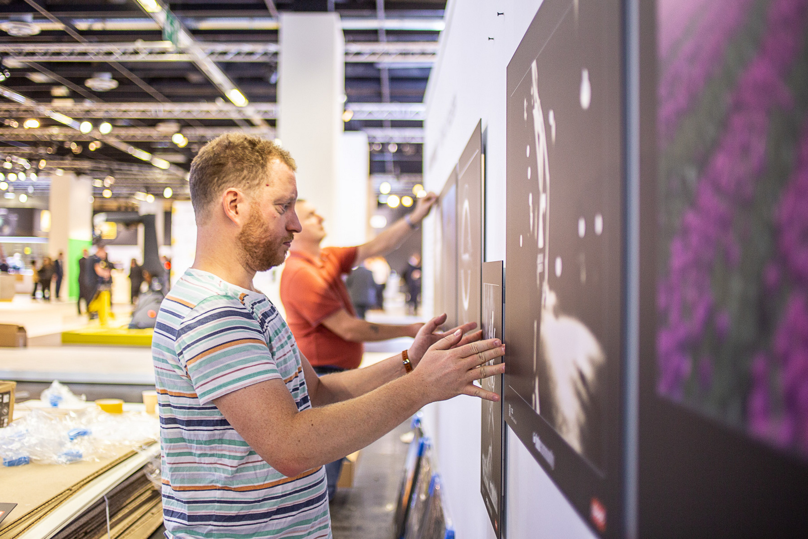 photokina 2018 - Aufbau der fotocommunity Ausstellung in Halle 2.2