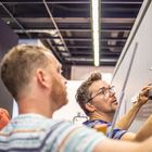 photokina 2018 - Aufbau der fotocommunity Ausstellung in Halle 2.2