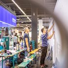 photokina 2018 - Aufbau der fotocommunity Ausstellung in Halle 2.2