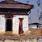 Pilgrims pass the chorten top the Wangdue Phodrang dzong