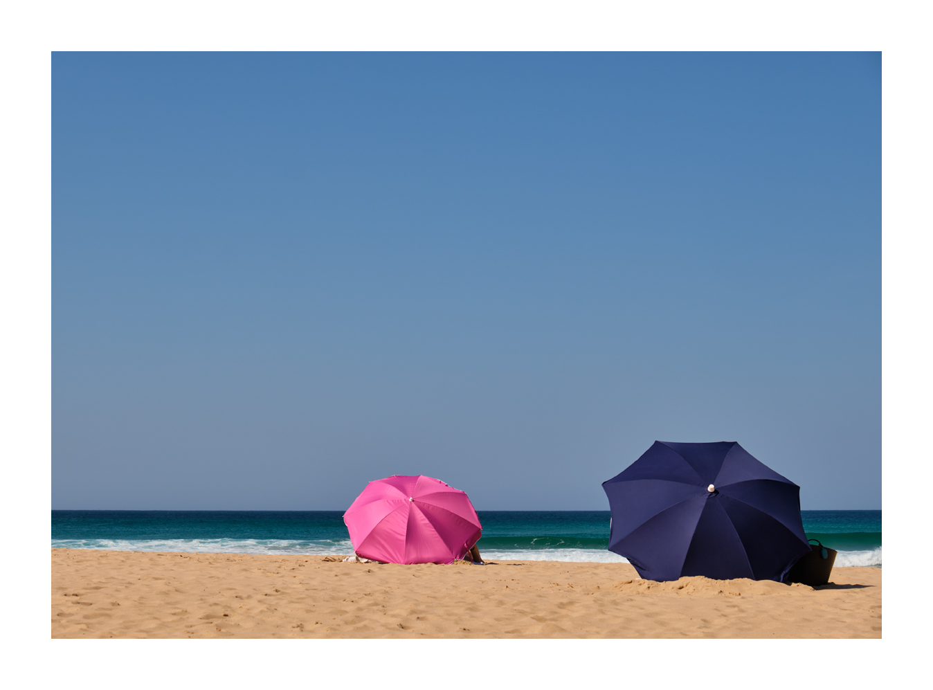 Pink und blau am Strand 