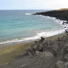 Playa de arena verde