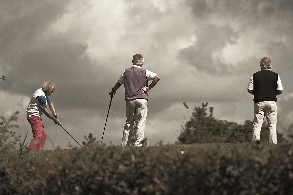 playing golf