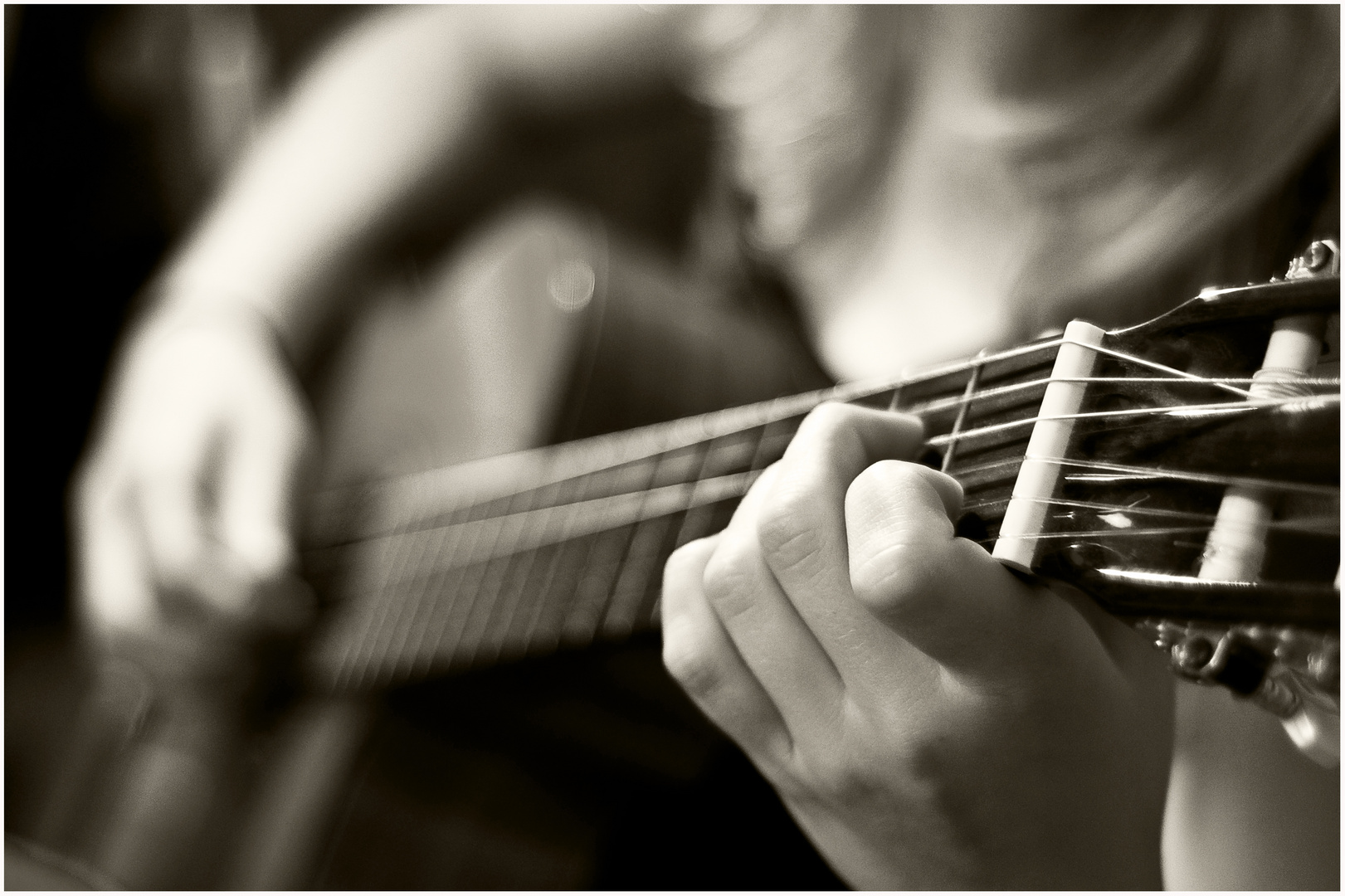 playing her guitar