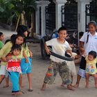 Playing kiddies on city roads in Vientiane