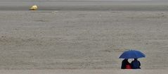 Pluie sur la plage