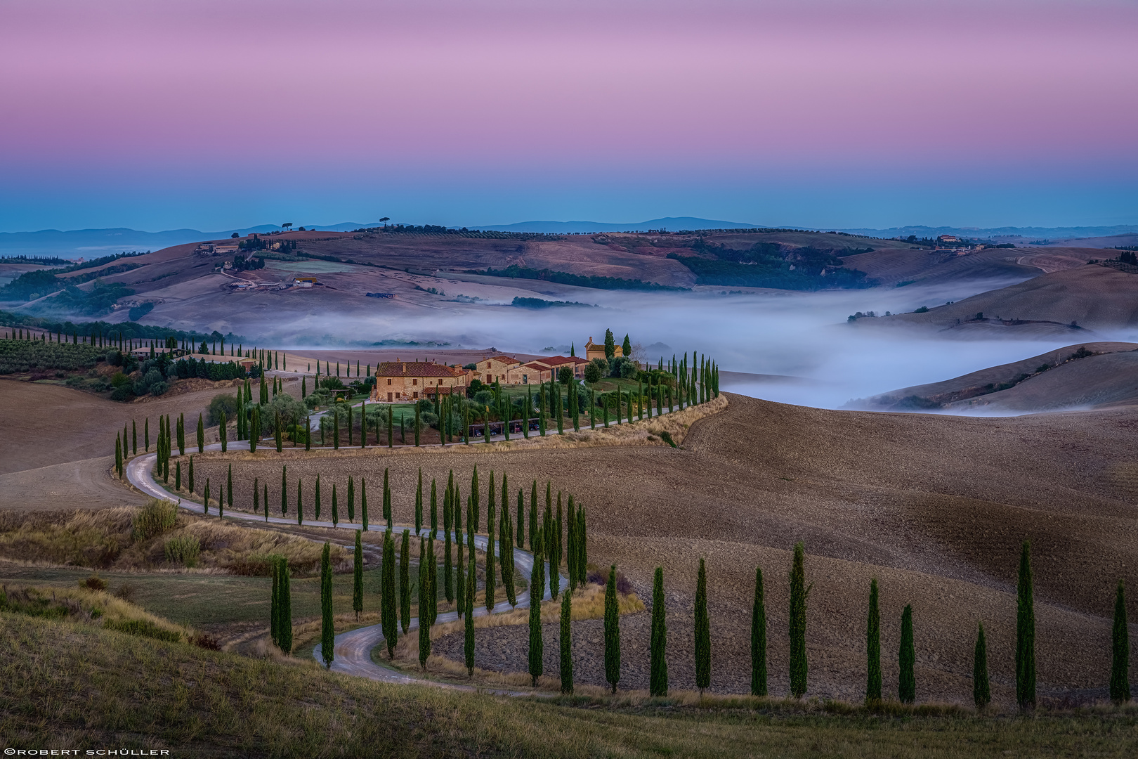 Podere Baccoleno: Herbstnebel in der Crete Senesi.