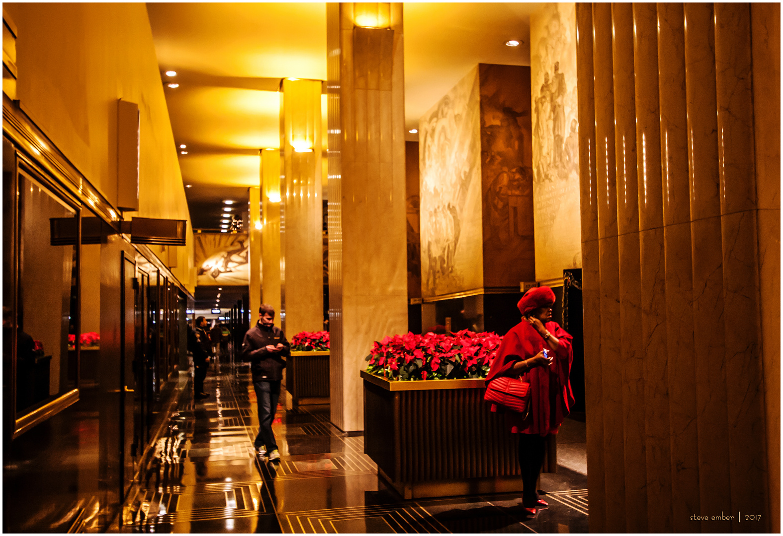 Poinsettias and Lady in Red in an Art Deco Space