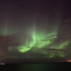 Polarlichtshow an der Küste von Keflavik