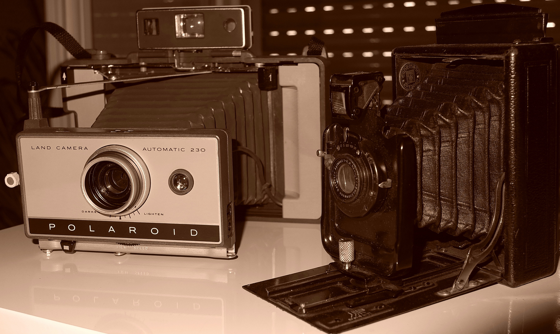 Polaroid et a Plaque