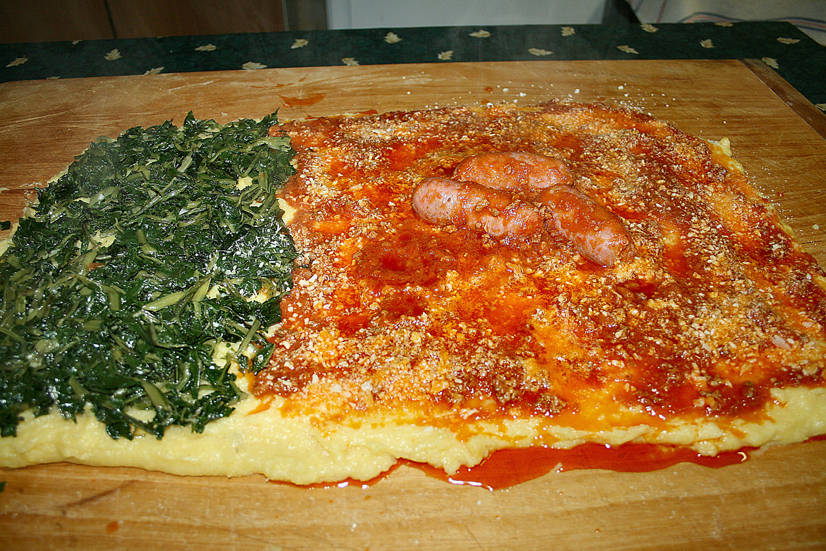 Polenta broccoletti e al sugo con salsiccie