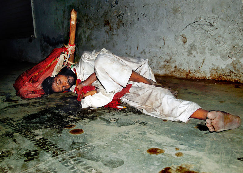 Poor Beggar sleep on the main road,Layyah,Pakistan.