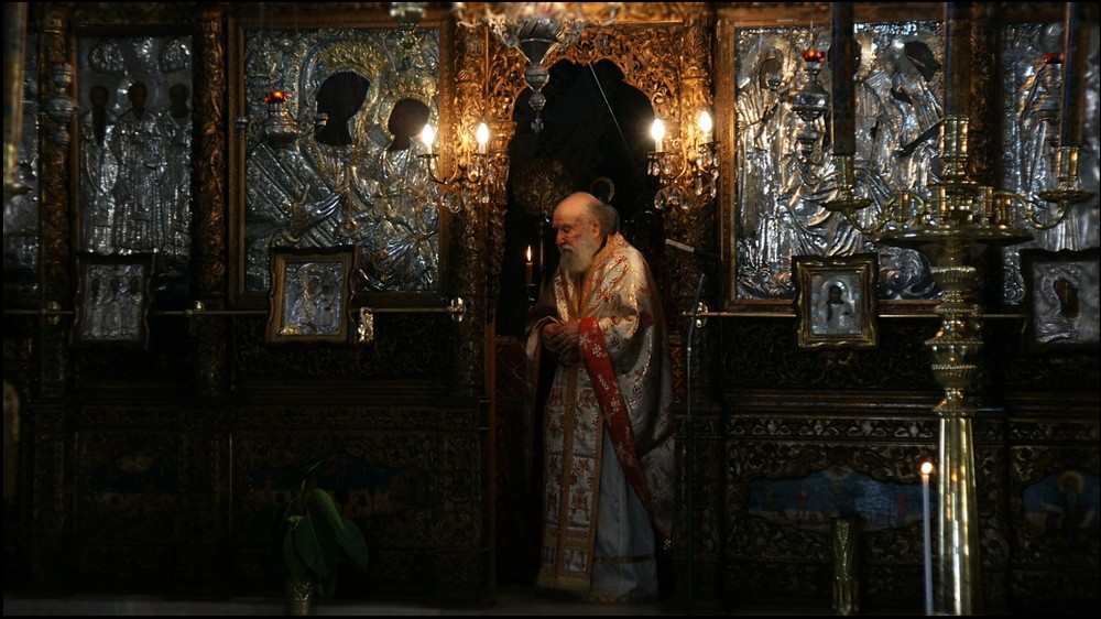 Pope de la Iglesia ortodoxa griega en Oia. Fascinante.