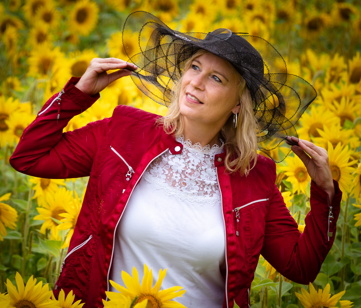 Portrait im Sonnenblumenfeld