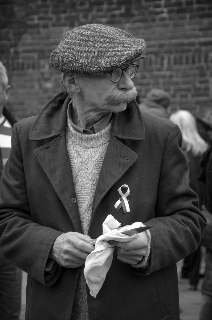 portrait of a knives sharpening man