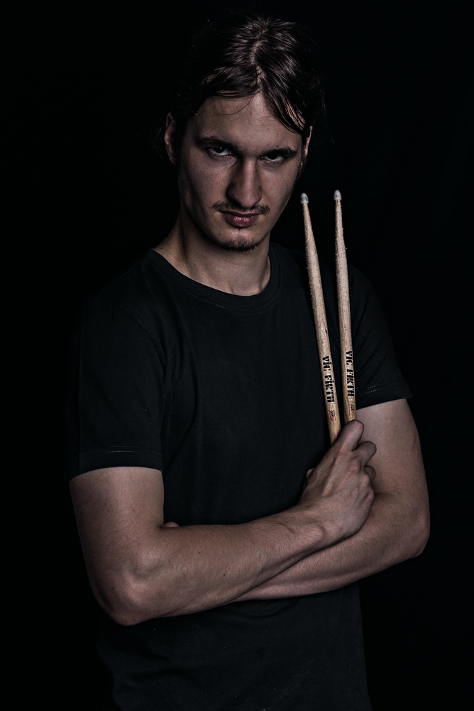 Portrait with drumsticks